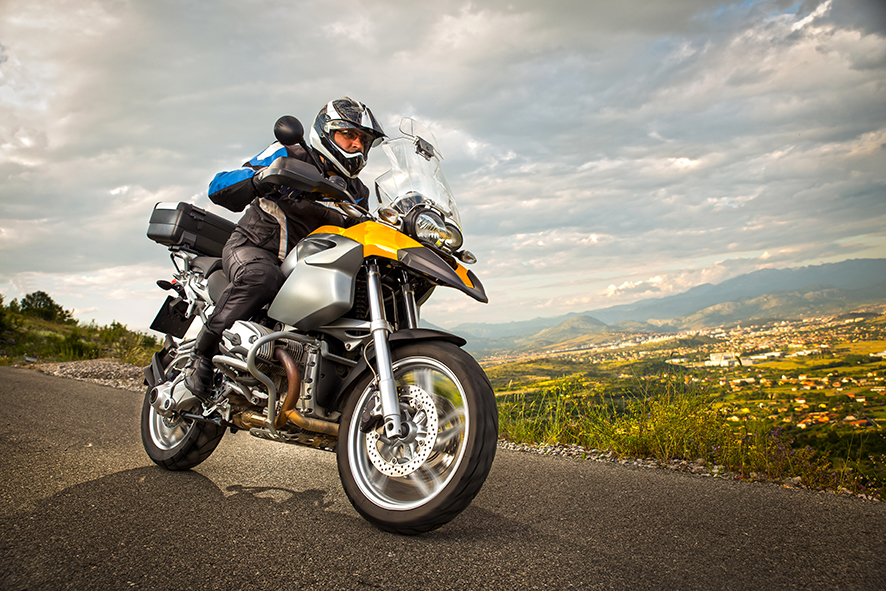 Biker Man Sits On A Bike